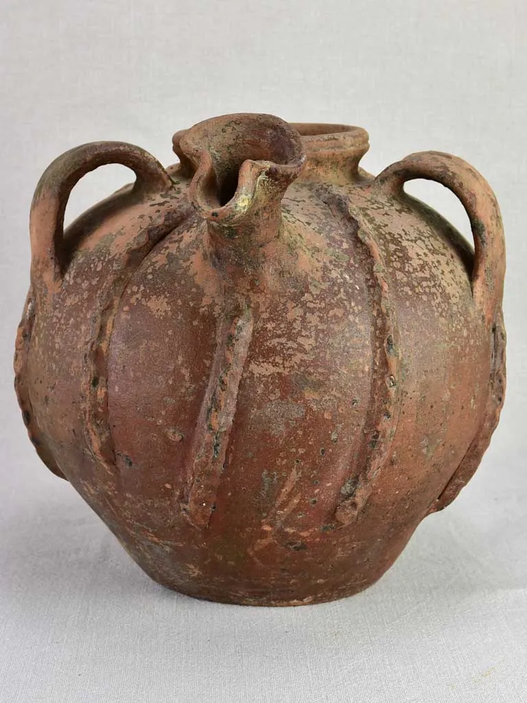 Large walnut oil pitcher from the early twentieth century 11½"